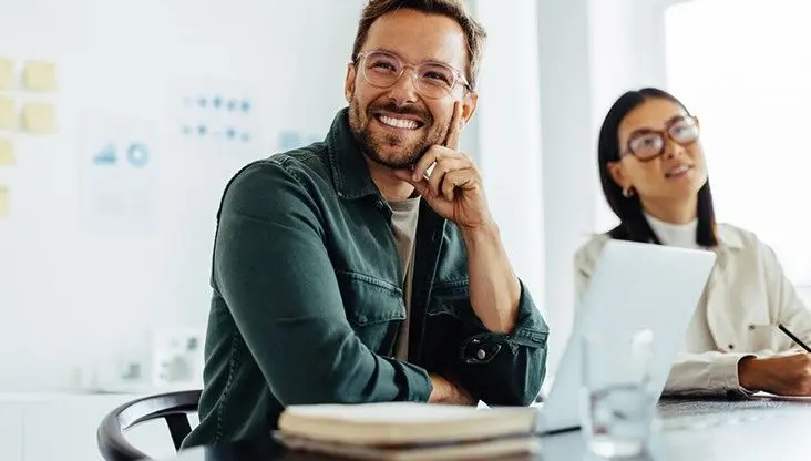 Professionals smiling in office setting